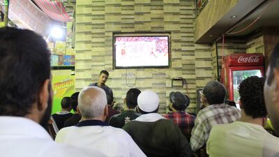 Liverpool fans celebrate in Cairo. Adham Youssef