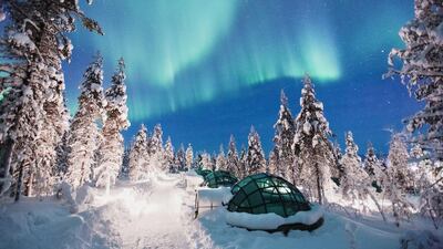 Glass Igloos at Kakslauttanen Arctic Resort with the Northern Lights. Valtteri Hirvonen / Kakslauttanen Arctic Resort