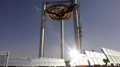 The Solar Beam Down Research Project in Masdar City transforms solar radiation into electricity more efficiently. Plans for solar energy's role in the city are under review.