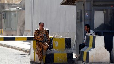 Yemeni soldiers outside the UN offices in Sanaa. The US and the UN have blamed the Houthis for a breakdown in efforts to extend Yemen's ceasefire. EPA