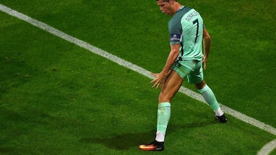 Portugal forward Cristiano Ronaldo celebrates scoring the opening goal during the Euro 2016 semi-final football match between Portugal and Wales at the Parc Olympique Lyonnais stadium in Décines-Charpieu, near Lyon, on July 6, 2016. Romain Lafabregue / AFP