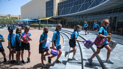 Pupils head back to class after lunch break.