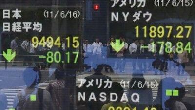 Global stocks slid to their lowest level in almost three months and the euro wobbled as Greece's debt woes deepened. Kim Kyung-hoon / Reuters