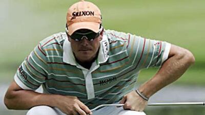 Sweden's Henrik Stenson lines up a putt on the 18th hole at the Gary Player Country Club.