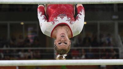 Canada’s Brittany Rogers competes in the qualifying for the women’s Uneven Bars. (AFP/Ben Stansall)