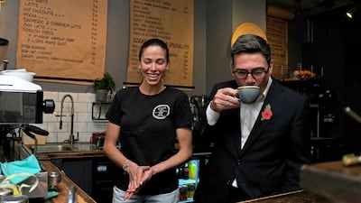 Andy Burnham during a visit to a coffee shop in Manchester. Reuters