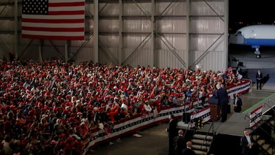 Supporters listen as Donald Trump speaks at Pensacola International Airport in Florida. Reuters