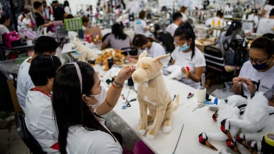 The workers make a sketch of the animal and create the pattern on cardboard which is then sewn onto fabric to create a shell. This is filled with the stuffing to create a plushie