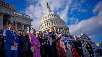 House Minority Leader Hakeem Jeffries, joined by fellow House Democrats, speaks on the House steps on November 12, in Washington. Getty Images via AFP