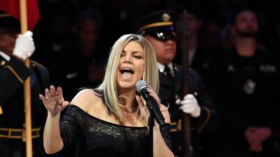 Singer Fergie performs the national anthem prior to an NBA All-Star basketball game. AP photo