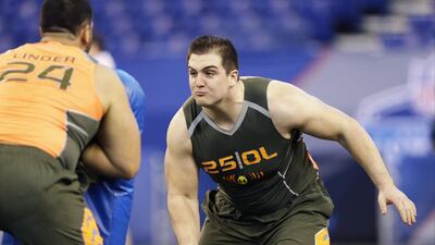 Ohio State offensive lineman Corey Linsley runs a drill at the NFL scouting combine in Indianapolis on February 22, 2014. Michael Conroy / AP Photo