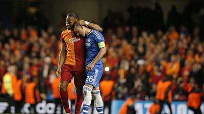 Didier Drogba and John Terry at the end of the match on Tuesday. Adrian Dennis / AFP / March 18, 2014