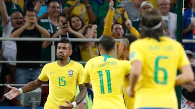 Paulinho, left, scored a fine goal to open the scoring for Brazil in the 2-0 win over Serbia. Felipe Trueba / EPA