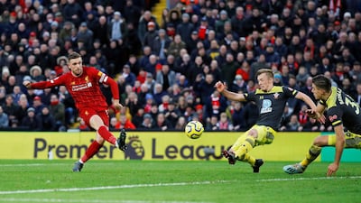 Liverpool's Jordan Henderson scores his team's second goal at Anfield on Saturday. Reuters