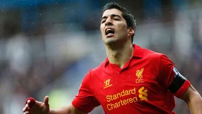 Luis Suarez will be 'on the plane' to rejoin Liverpool and have talks, says manager Brendan Rodgers. Eddie Keogh / Reuters