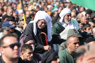 People attend the funeral of Saif Al Islam Qaddafi in Bani Walid. Reuters