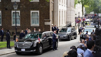 The President's convoy arrives in Downing Street. PA