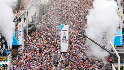 Runners start the Tokyo Marathon as they pass the Tokyo Metropolitan Government Building in the Shinjuku area of downtown Tokyo on March 2, 2025. (Photo by Hiro Komae / POOL / AFP)