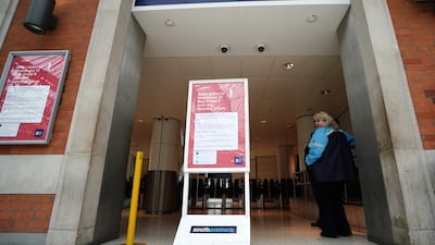 A sign warns passengers of strikes at Waterloo Station in central London. PA