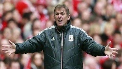 FILE - Liverpool's manager Kenny Dalglish reacts as he watches his team play Chelsea during the English FA Cup Final soccer match at Wembley Stadium in London, in this file photo dated Saturday, May 5, 2012. The American owners of Liverpool soccer club, Fenway Sports Group terminated Dalglish's contract on Wednesday May 16, 2012, after less than 500 days in charge of the top flight team. (AP Photo/Tim Hales, File) *** Local Caption *** Britain Soccer Liverpool Dalglish Out.JPEG-03f5f.jpg