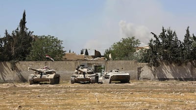 Pro Syrian regime forces are seen as they advance towards the town of Douma, the last opposition holdout in Eastern Ghouta, on April 7, 2018, after regime troops resumed a military blitz to pressure rebels to withdraw. AFP