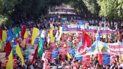 Portuguese protesters against the government's austerity measures march down Lisbon's Liberdade Avenue.