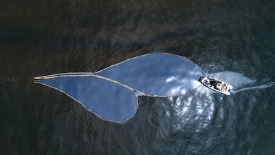 An drone photograph of clean-up operations in the Ventanilla Sea, north of Lima, Peru, after an oil spill. EPA