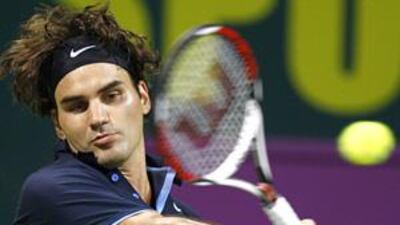 Roger Federer, in action in Doha, is confident he is in good shape physically to try to win more grand slam titles this year.