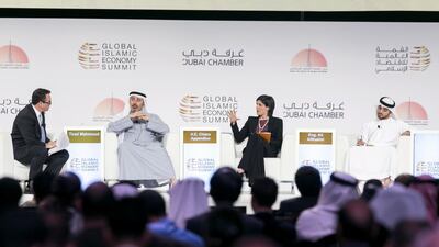 Tirad Mahmoud, Group chief executive of Abu Dhabi Islamic Bank, left, Chiara Appendino, Mayor of the City of Turin and Ali Al Nuaimi, Senior Nuclear Professional and Member of the Emirates Youth Council, at the first plenary Session of the Global Islamic Economy Summit 2016. Reem Mohammed / The National