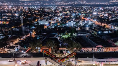 An aerial view of the scene after an elevated section of metro track in Mexico City, carrying train cars with passengers, collapsed onto a busy road, killing at least 20 people and injuring 70. Getty Images