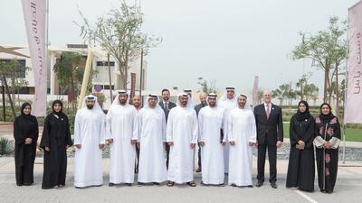 Sheikh Mohammed stands for a photograph while inspecting urban development and tourism projects at West Yas. Hamad Al Mansouri for Crown Prince Court - Abu Dhabi