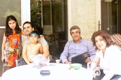 Amir Hekmati and his extended family in Tehran, Iran, in August 2011. AP