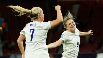 England's Ellen White and Beth Mead celebrate after the match. Reuters