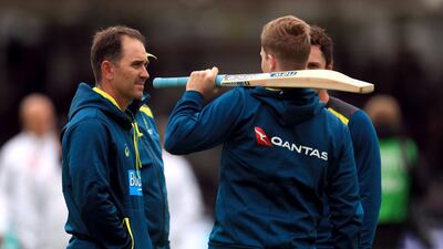 Australia coach Justin Langer, left, and Steve Smith inspect the pitch. Mike Egerton / PA Wire