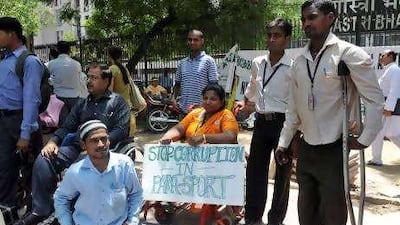 Disabled Indian athletes protest against the Commonwealth Games at the sports ministry in New Delhi.