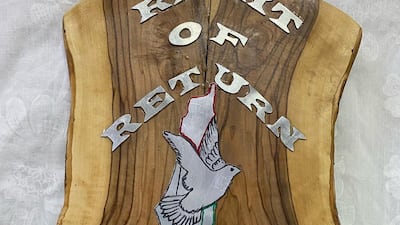 An olive wood sign at the Key of Return shop. Photo: Art48House / Instagram