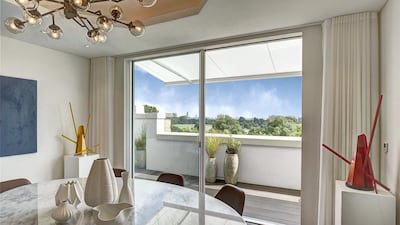 Floor-to-ceiling sliding patio doors on to the private terrace are combined with an open floor plate. Courtesy Berkshire Hathaway HomeServices London