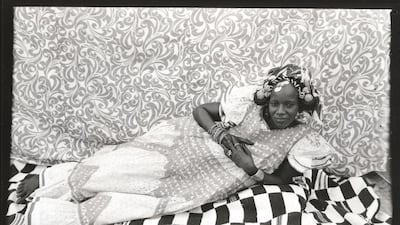 Seydou Keïta's Reclining Woman is part of the photography exhibition at The Metropolitan Museum of Art. Keïta / SKPEAC