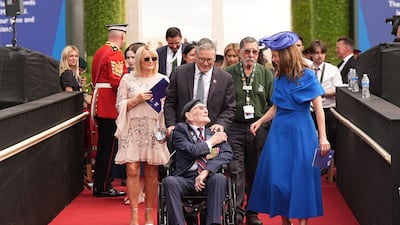 Keir Starmer helps a war veteran at a remembrance service in Staffordshire in August 2025, marking the 80th anniversary of VJ Day. PA