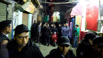 Egyptian riot police block access to the street. AFP