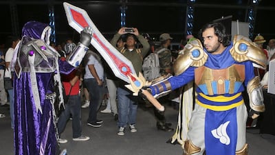 World of Warcraft character Paladin shows down with League of Legends character Garen at the IGN Convention Abu Dhabi at Du Forum in Abu Dhabi. Sarah Dea / The National