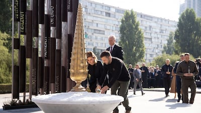 Ukraine's President Volodymyr Zelenskyy (C-R) and his wife, Olena Zelenska, at the unveiling of the 'Memorial to the Victims of the Crimean Tatar Genocide', to the victims of deportation carried out by Soviet authorities in 1944, in Kyiv, on September 11. EPA