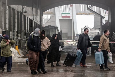 Mainly Iranian Kurds arrive at the Haji Omran border crossing with Iran. AFP