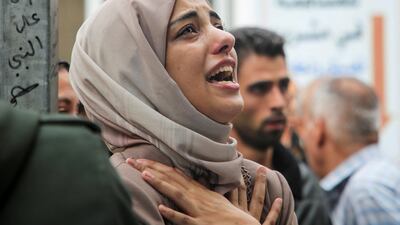 A mourner reacts during the funeral of Palestinians killed in Israeli strikes, in Rafah, the southern Gaza Strip, on Monday. Reuters