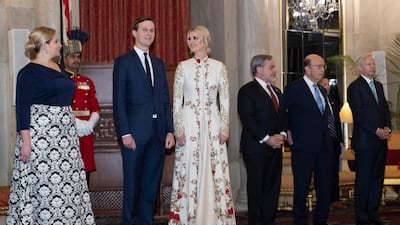 Ivanka Trump in an embroidered and flowing anarkali suit with a bandhgala collar is a design by New Delhi-designer Rohit Bal. AP