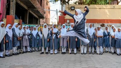 A Muslim girl practices 'Vovinam', a Vietnamese martial art at St Maaz high school in Hyderabad, India. AFP