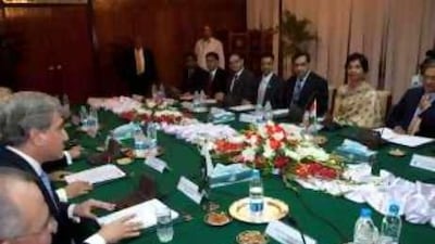 The Indian foreign minister, SM Krishna (right), leads his delegation as he talks with his Pakistani counterpart, Shah Mehmood Qureshi (second left) during their meeting at the Pakistani foreign ministry in Islamabad.