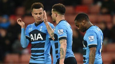 Dele Alli, left, scored twice against Stoke City to help Tottenham to an emphatic victory. Michael Regan / Getty Images