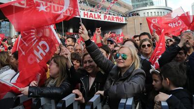 Supporters of main oppositional Republican People's Party hold Turkish flags in front of their in Ankara, Turkey. EPA