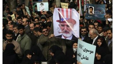 People attend the funeral of Sane'e Jaleh, a student who was shot dead during an opposition rally on Monday, in Tehran yesterday. The opposition claims the funeral was hijacked by government supporters.